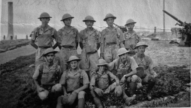 Members of the Gibraltar Defence Force (GDF) pose for a group photograph at Europa Point during WWII. In the background stands the distinctive sewer vent once located near the lighthouse.

The men of the GDF were employed in manning the 3.7-inch Heavy Anti-Aircraft guns positioned at Europa Point, with one of these guns visible in the immediate background on the right of the image.

#gibraltar #wwii #ww2 #history #heritage

📸 Kenneth Busuttil