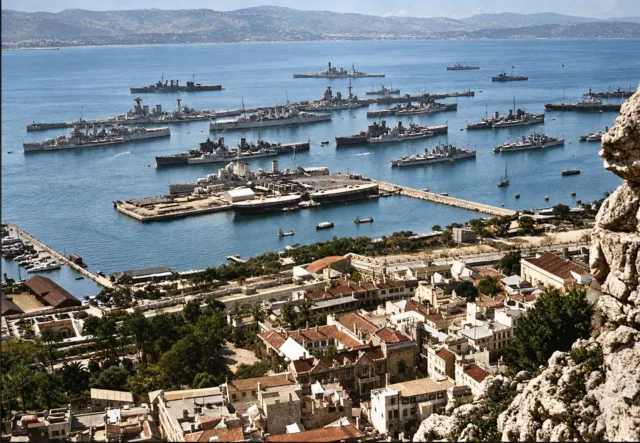 Gibraltar, 1938, during joint naval manoeuvres involving the Royal Navy’s Home and Mediterranean Fleets.

The photograph shows a large concentration of British naval vessels in Gibraltar Harbour.

Beyond the Mole are the County-class heavy cruiser HMS Cornwall, the battlecruisers HMS Repulse and HMS Hood, and the destroyers HMS Grafton and HMS Glowworm.

Alongside the Mole is the battleship HMS Rodney, with two additional County-class heavy cruisers and two Town-class light cruisers also visible.

The nearest vessel is identified as the Arethusa-class light cruiser HMS Galatea, with her sister ship HMS Aurora in the second row on the far right.

#Gibraltar #History #WWII #WW2 #Heritage RoyalNavy